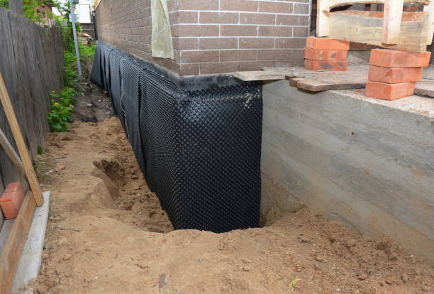 Happy homeowners after waterproofing job in Crane Hill